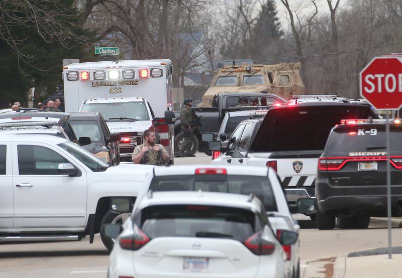 Police secure the scene of a two-story apartment building on the corner of Seventh and Charters on Sunday, March 30, 2025 in La Salle. A barricaded armed subject fired shots at officers. Police from across the Illinois Valley assisted in the incident.