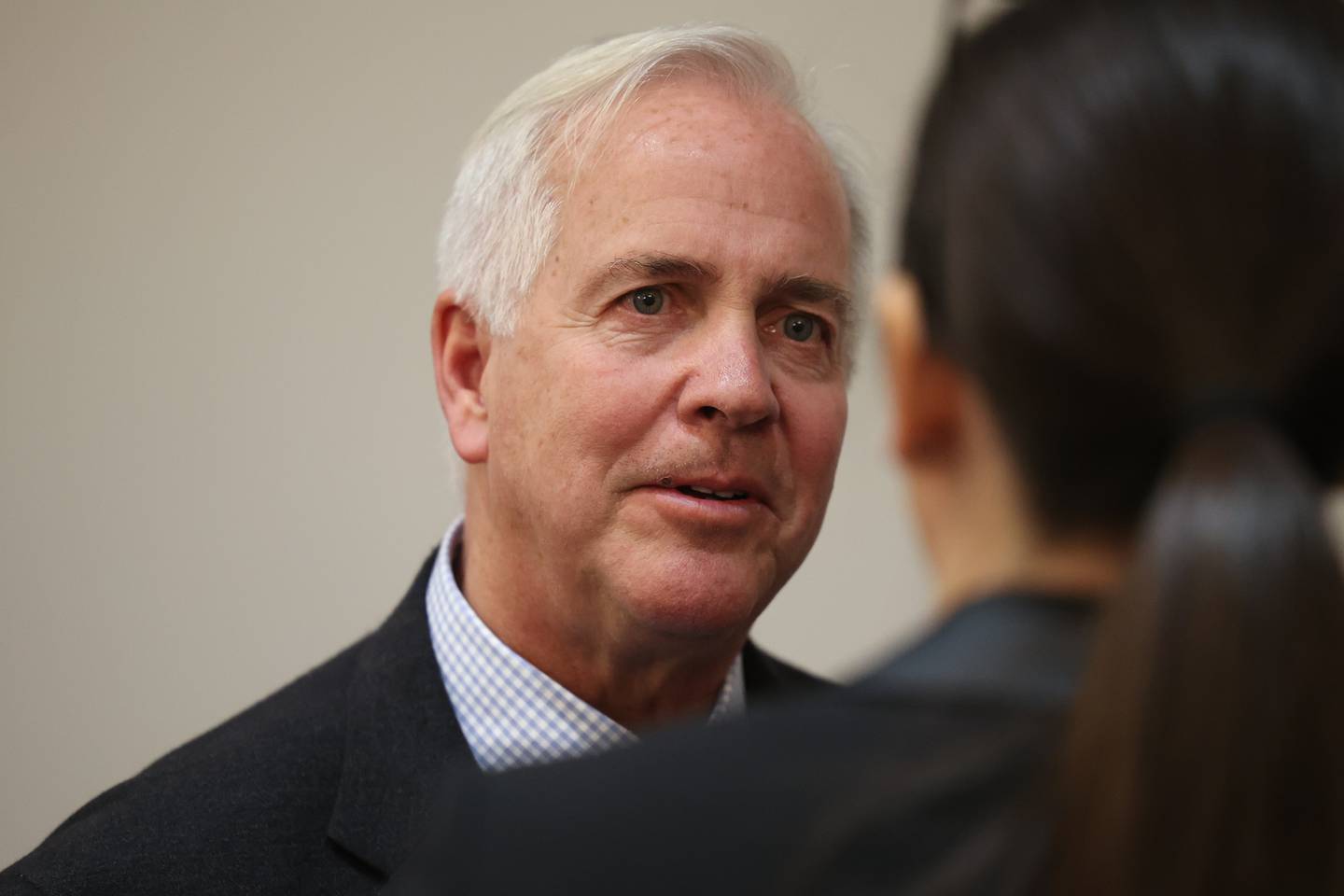 Mayor candidate Terry D’Arcy talks to a guest at the Joliet Mayoral Candidate Panel luncheon hosted by the Joliet Region Chamber of Commerce on Wednesday, March 8th, 2023 at the Clarion Hotel & Convention Center Joliet.