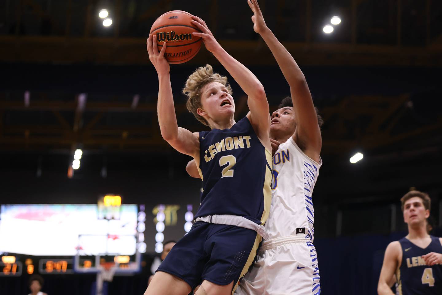 Lemont’s Rokas Castillo finesses in a layup against Simeon in the Class 3A super-sectional at UIC. Monday, Mar. 7, 2022, in Chicago.