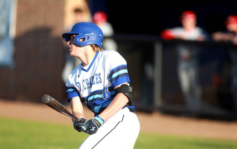 St. Charles North’s Keaton Reinke watches his hit during a Class 4A St. Charles North Sectional semifinal game against South Elgin on Wednesday, May 29, 2024.