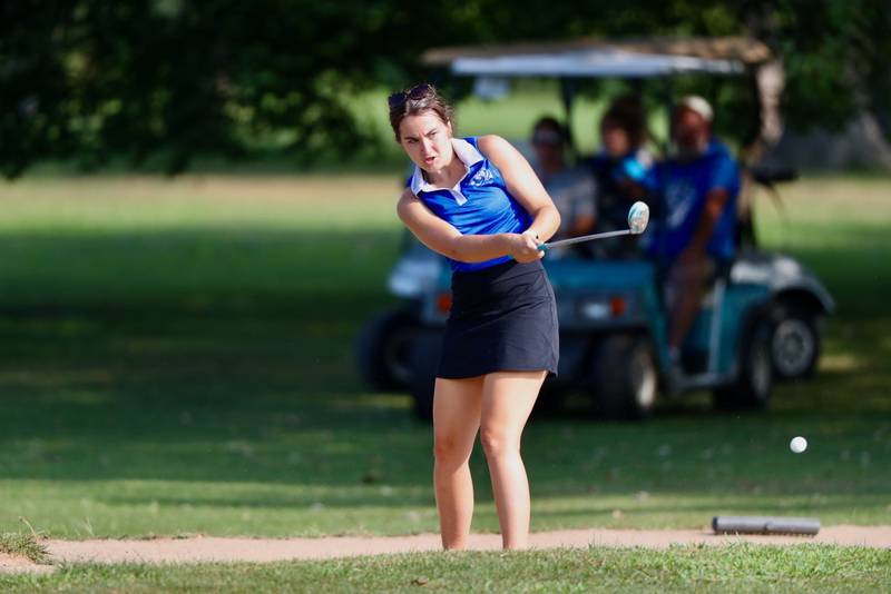 Princeton's Halli Peterson swings at Wyaton Hills Saturday.