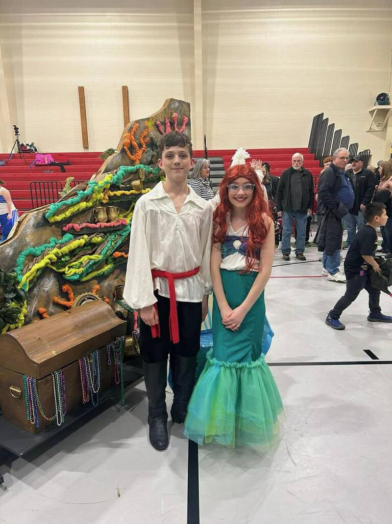 St. Michael the Archangel Catholic School students Mason Cole as Prince Eric and Ella Sokol as Ariel pose for a photo during a recent performance of "The Little Mermaid Jr."