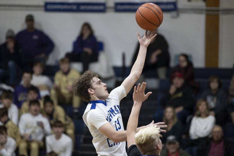 Newman’s Nolan Britt puts up a shot late in the first half Tuesday, Dec. 13, 2022 against Pecatonica.