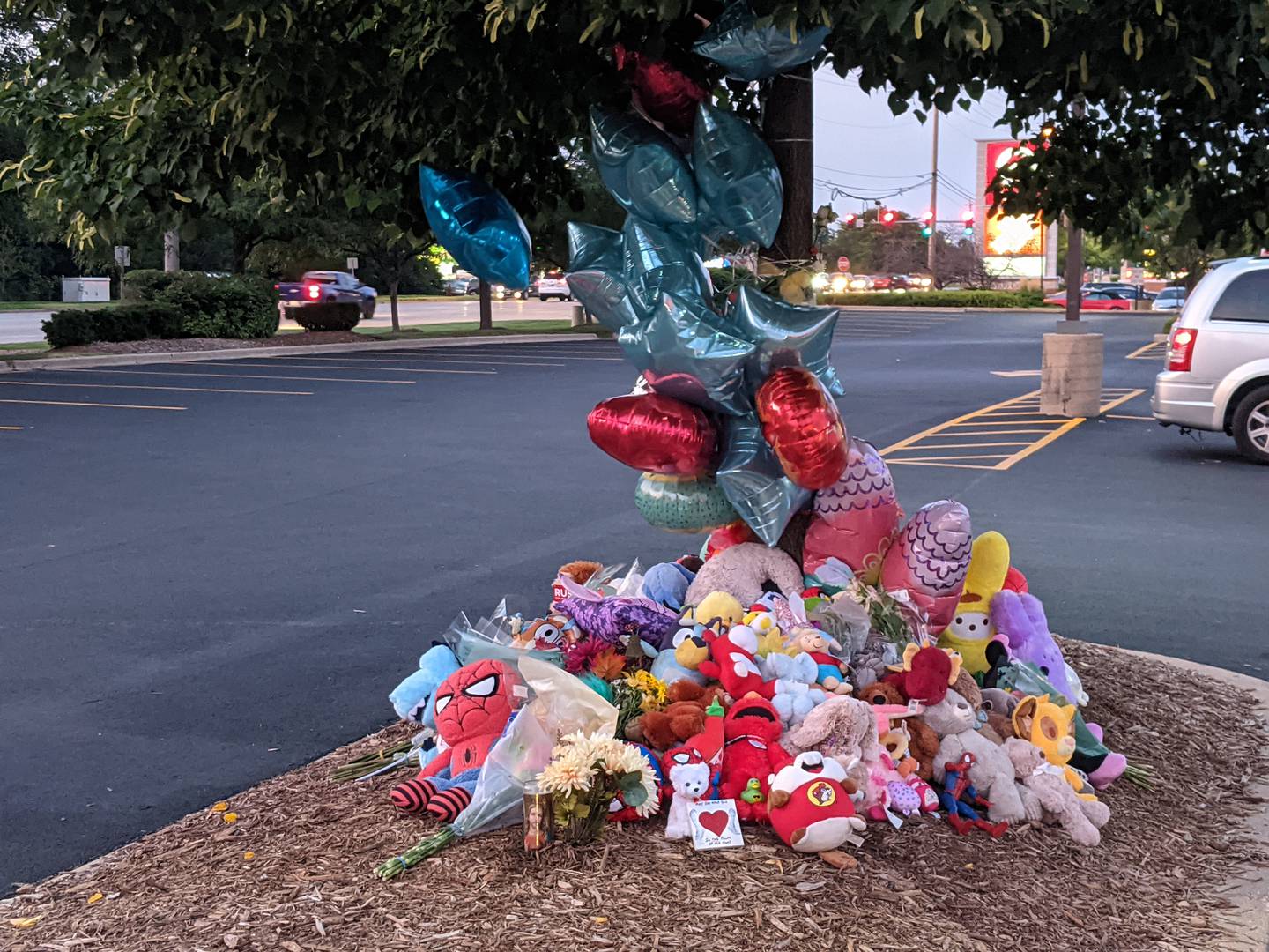 A memorial has been set up in front of the Portillo's restaurant in Oswego where a 2-year-old boy was killed when a car drove into the restaurant Wednesday, July 30, 2025.