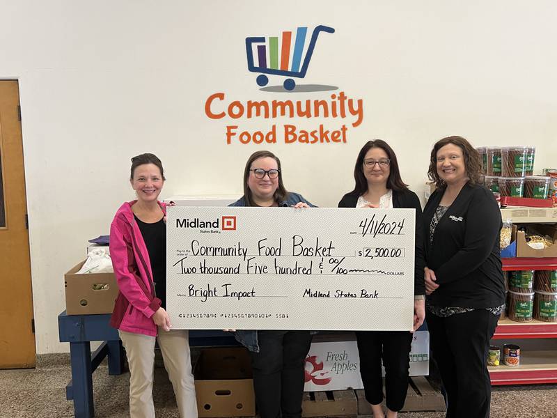 Midland States Bank presents a $2,500 donation to Community Food Basket of Ottawa with (from left) Bobette Roberson, personal banker, Midland States Bank; Marissa Vicich, executive director, Community Food Basket; Salina Palevo, banking center manager, Midland States Bank; and Carri Alexander, commercial services relationship manager, Midland States Bank.