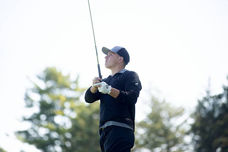 Sycamore’s Luther Swedberg tees off on no.11 at Emerald Hill in Sterling for the Class AA IHSA sectional golf meet.