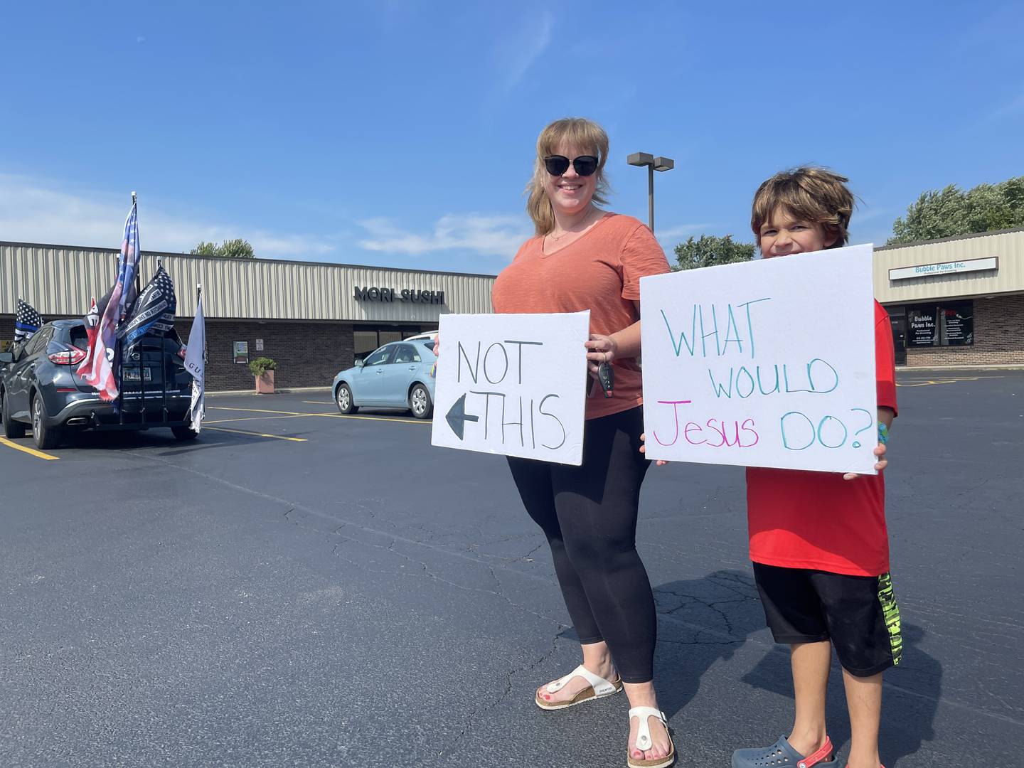 Ashley and Xavier Rufino, of Algonquin, said they support UpRising Bakery in Lake in the Hills and showed up to counter protest on Saturday, Sept. 17, 2022.