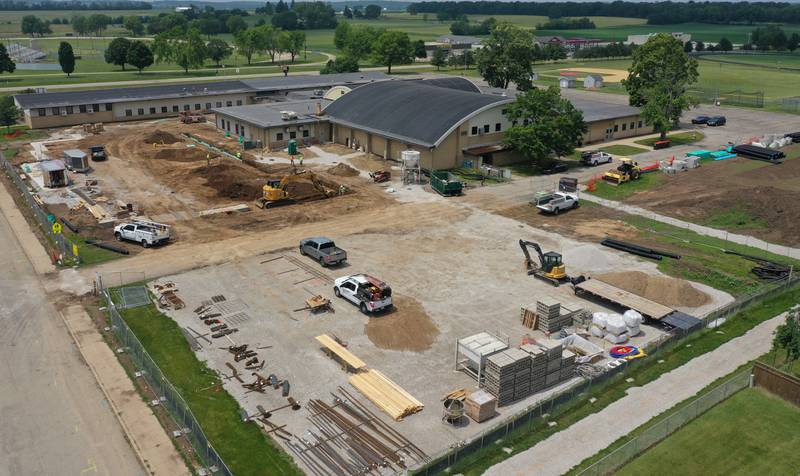 Crews from MCP Midwest work on the new Henry-Senachwine High School academic wing addition on Monday, June 9, 2025 in Henry. The building is expected to take over a year to be completed in time for the 2026-2027 school year.