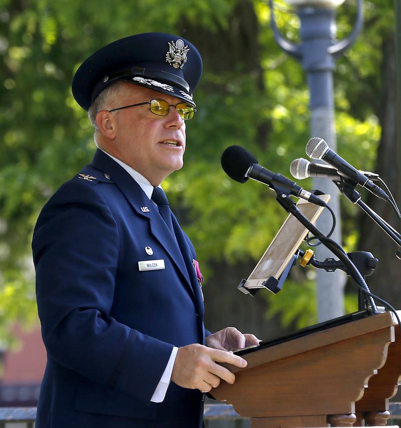 Retired U.S. Air Force Lt. Col. Craig Wilcox speaks during the Woodstock VFW Post 5040 City Square Memorial Day Ceremony and Parade on Monday, May 29, 2023, in Woodstock.