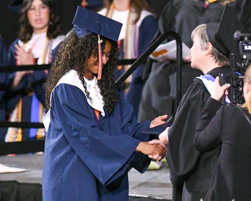 Oswego High school senior Aliyah Desiree Roldan Salinas is all smiles after receiving her diploma on Saturday May 17, 2025, during the graduation Ceremony held at the Convocation Center in DeKalb.