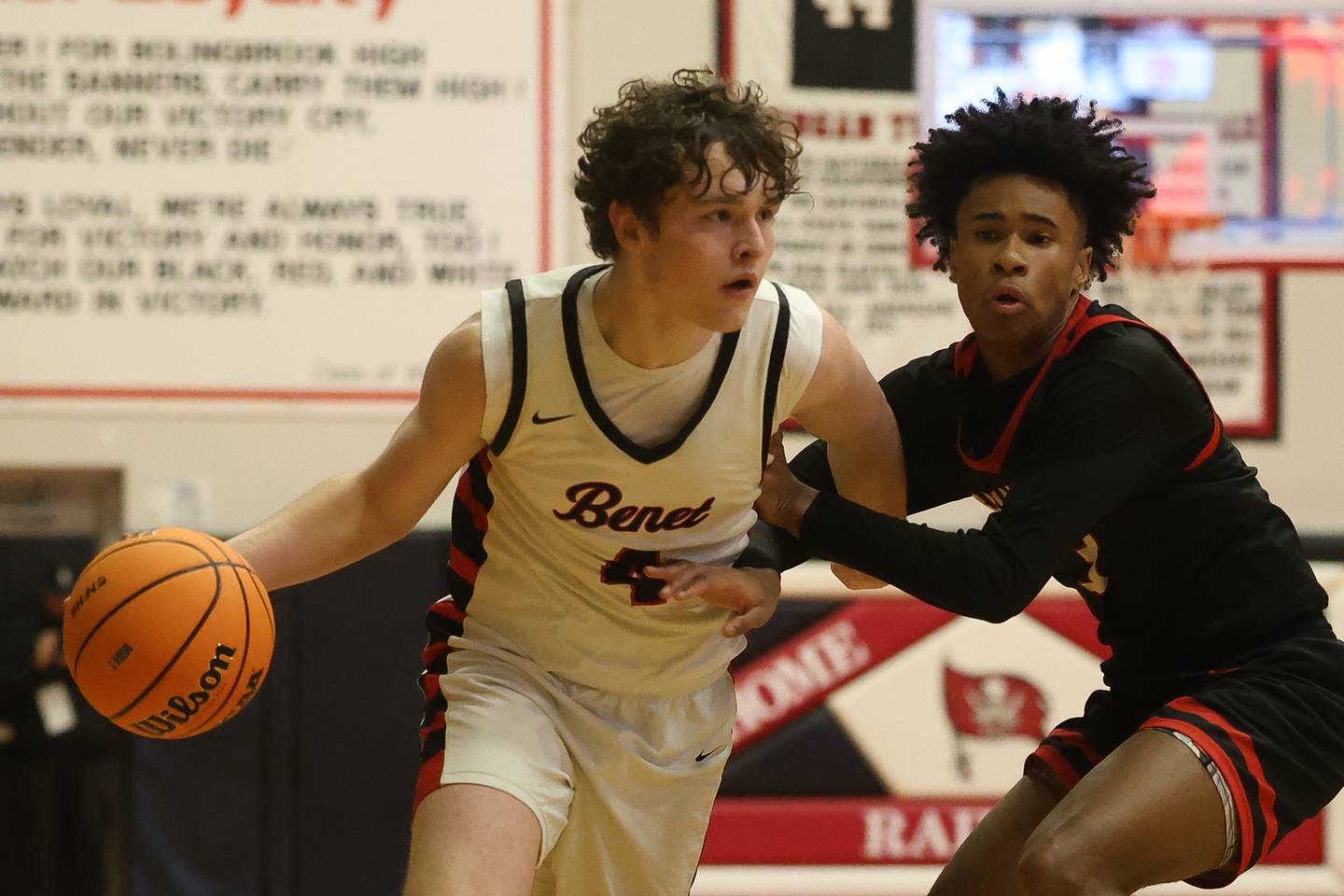 Benet’s Ethan MacDermont works the ball against Bolingbrook in the Class 4A Bolingbrook Sectional championship game on Friday, March 6, 2026 in Bolingbrook.
