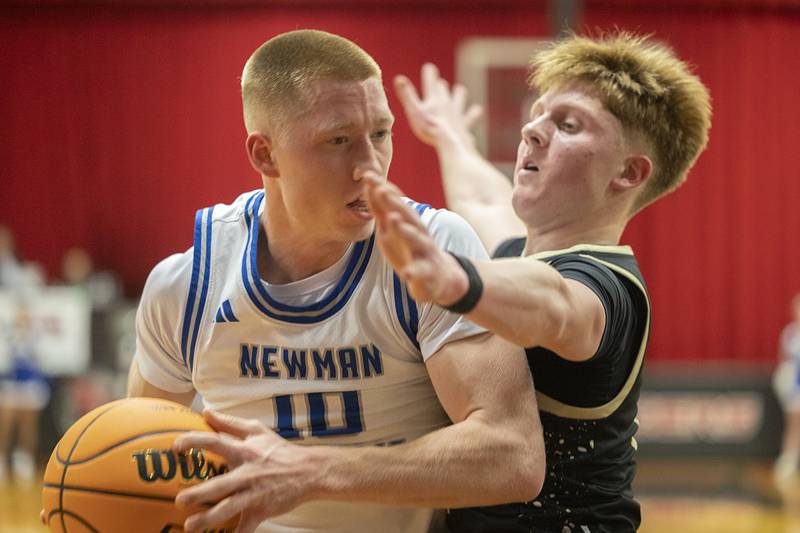Newman’s George Jungerman works against Pecatonica’s Cooper Hamilton uesday, March 3, 2026, in the 1A sectional semifinal.