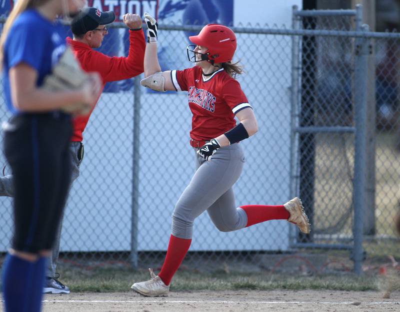 West Aurora’s Callie Meinel rounds third base after hitting a home run during a game against Geneva during a home game on Wednesday, March 16, 2022.