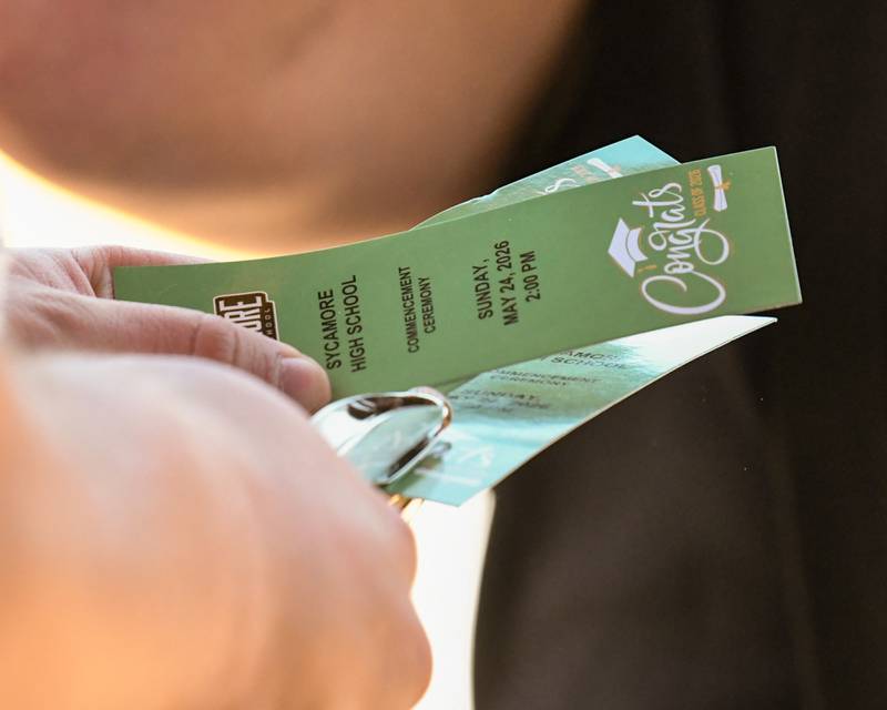 Graduation tickets are punched as attendees enter the fieldhouse for the Sycamore Class of 2026 Commencement on Sunday, May 24, 2026, at Sycamore High School.