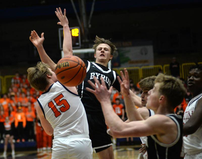 Byron's Ryan Tucker (10) watches the ball into the hands of teammate at the 2A Supersectional in Sterling on Monday, March 4, 2024. The Tigers beat Chicago Latin 85-71 to advance to the state finals this week in Champaign.