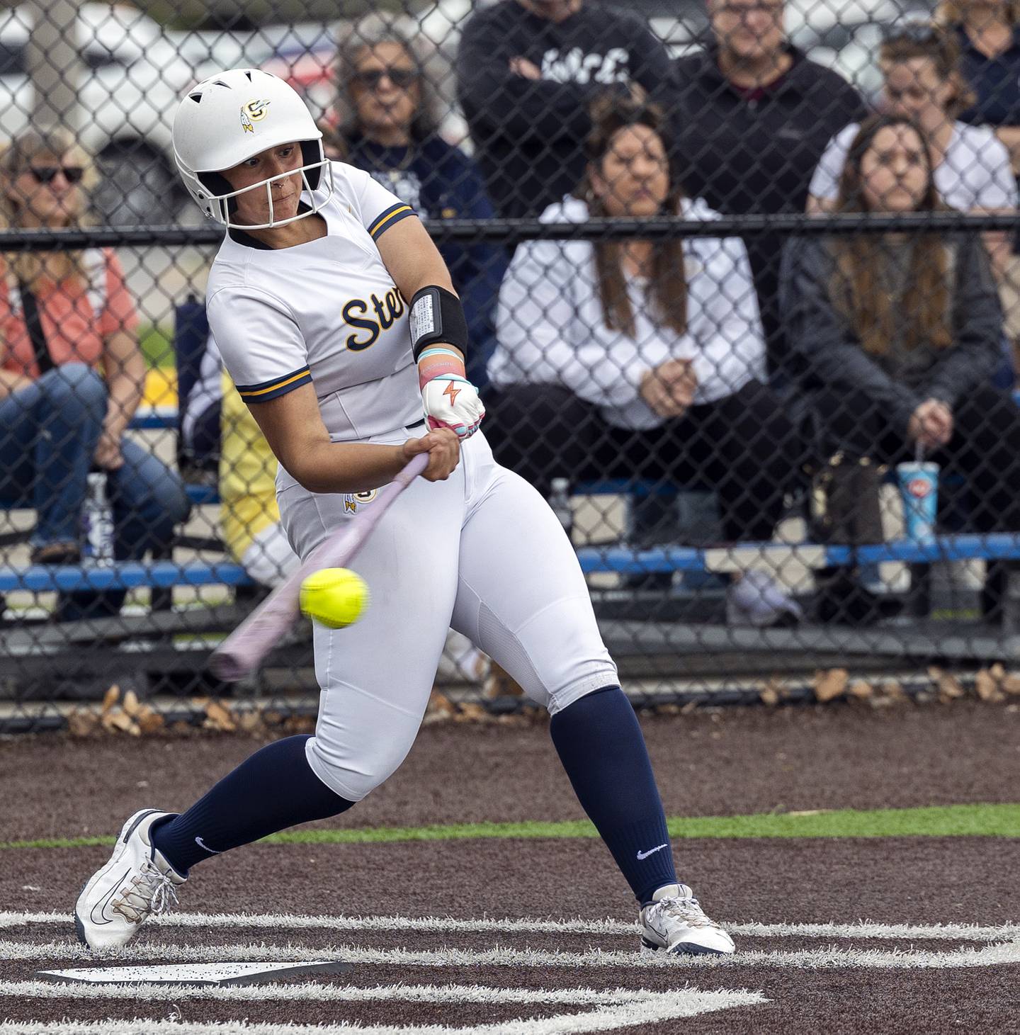Sterling’s Lily Martinez drives in two against Moline Tuesday, April 22, 2025.
