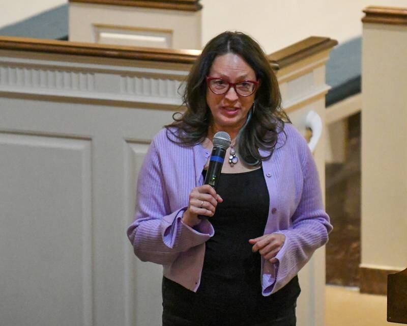 Kris Ducett, executive director of Bright Stars of Bethlehem speaks about the program and her time in Palestine and Israel on Tuesday, Nov. 21, 2023, during a prayer vigil for peace in Israel and Palestine on Tuesday, Nov. 21, 2023, at the First Congregational United Church of Christ in DeKalb.
