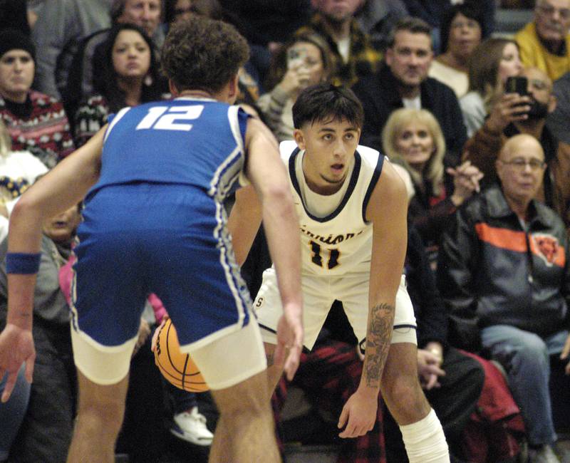 Sterling's Nico Battaglia watches his offense set up.. The action took place on Friday, December 13th at Sterling.