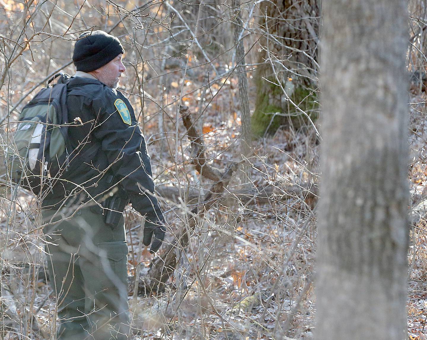 Conservation Police officer Joe Kaufman, leads a ground search off trail near French Canyon on Friday, Jan. 17, 2020 at Starved Rock State Park. Conservation Police along with Utica and Oglesby fire departments were conducting the ground search to find Tina Donovon, a missing woman from Ottawa.