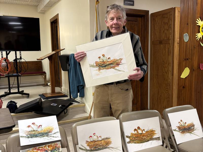 Visiting artist Dan Danielson displays the work of Morris Watercolor Guild artists during his visit in November.