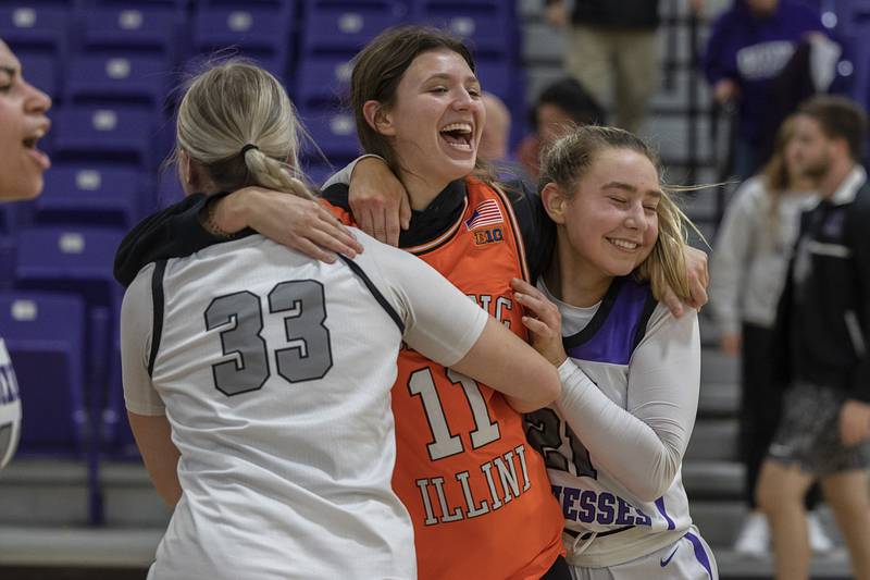 Dixon fans and players celebrate the Duchesses’ win over Sterling Tuesday, Feb. 13, 2024 during a regional semifinal at Rochelle.