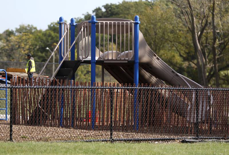 A safety fence blocks playground equipment from being used at Neubert Elementary School on Tuesday, Oct. 1, 2024, in Algonquin.