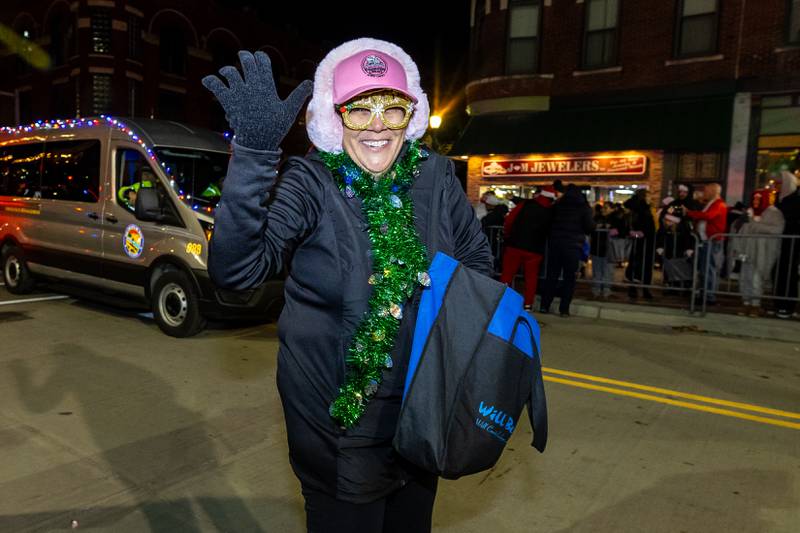 Will County Executive Jennifer Bertino-Tarrant shares holiday cheer during the Light Up the Holidays Parade in Downtown Joliet on Nov. 28, 2025.