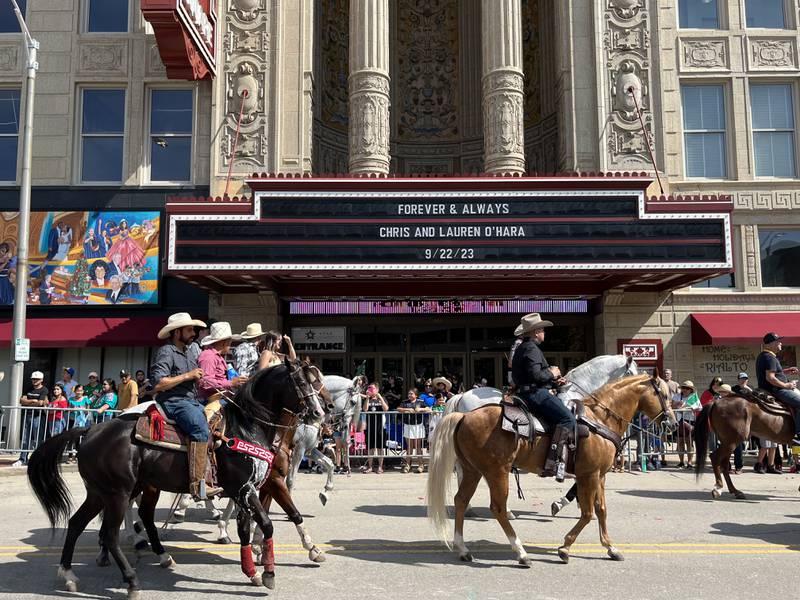 Horse riders in front of the Rialto Square Theatre for the 60th annual Mexican Independence Day parade on Saturday, Sept. 23, 2023, in downtown Joliet.