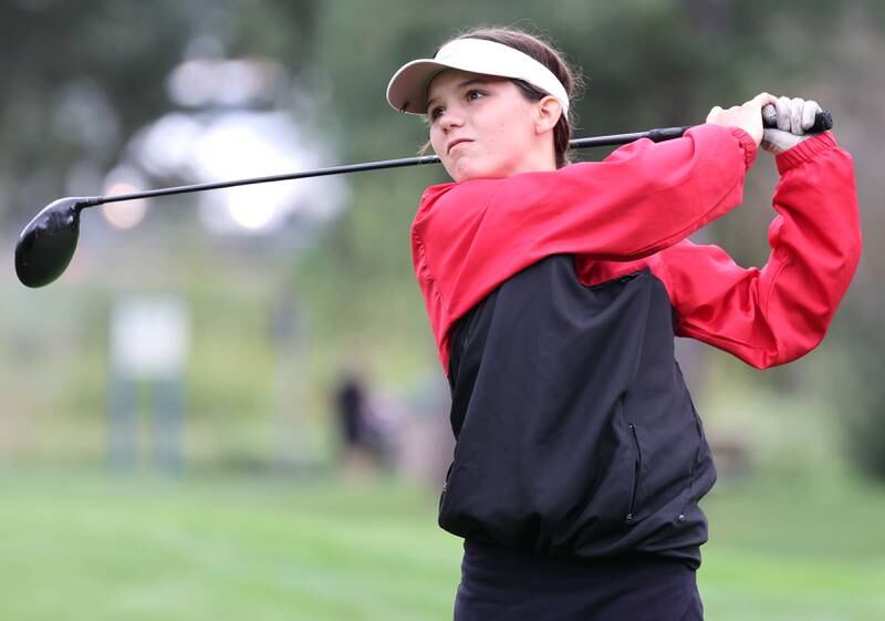 South Elgin’s Autumn Burnett tees off on the first hole Thursday, Sept. 28, 2023, during the Class 2A girls golf regional at Sycamore Golf Club in Sycamore.