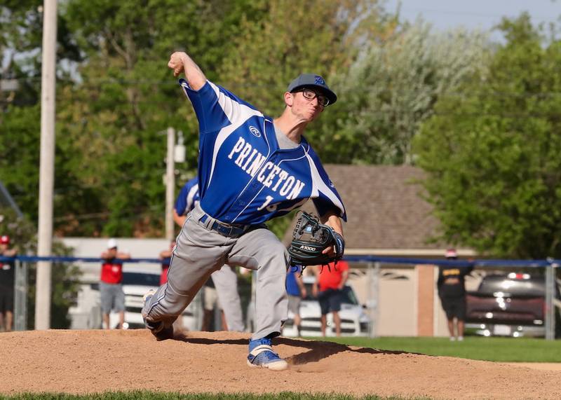 PHS senior Wyatt Baker fires a pitch Monday.