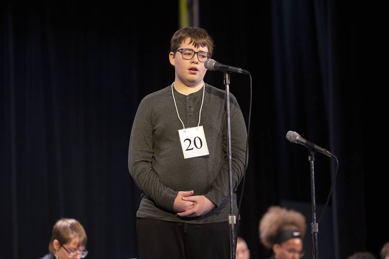 Paw Paw Jr. High seventh grader Liam Crumpton appears on stage Thursday, March 9, 2023 during the Lee-Ogle-Whiteside Regional Spelling Bee.