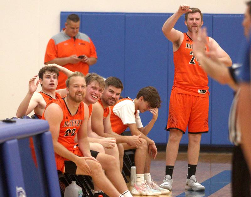 McHenry’s Warriors cheer during an alumni basketball game at Johnsburg High School Saturday evening to benefit the family of Jackson Werderitch, a 10-year-old who was struck by a car.