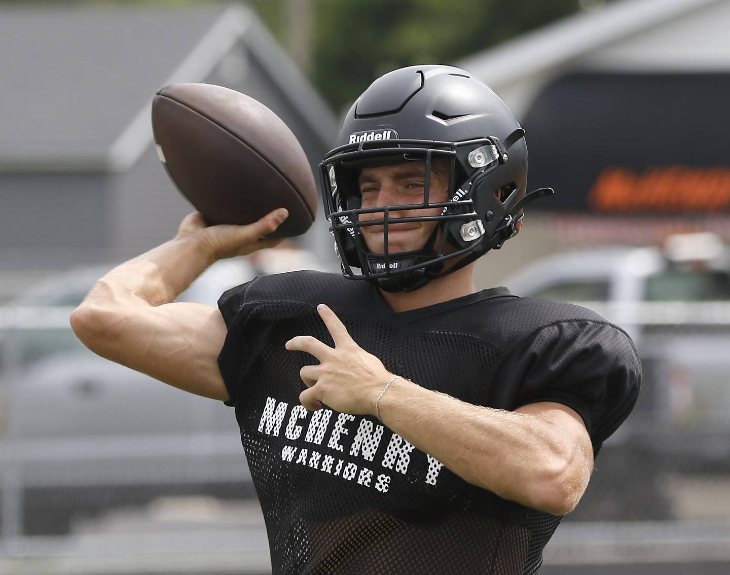 McHenry’s Jeff Schwab throws a pass during football practice on Thursday, July 24, 2025, at McCracken Field, in McHenry.