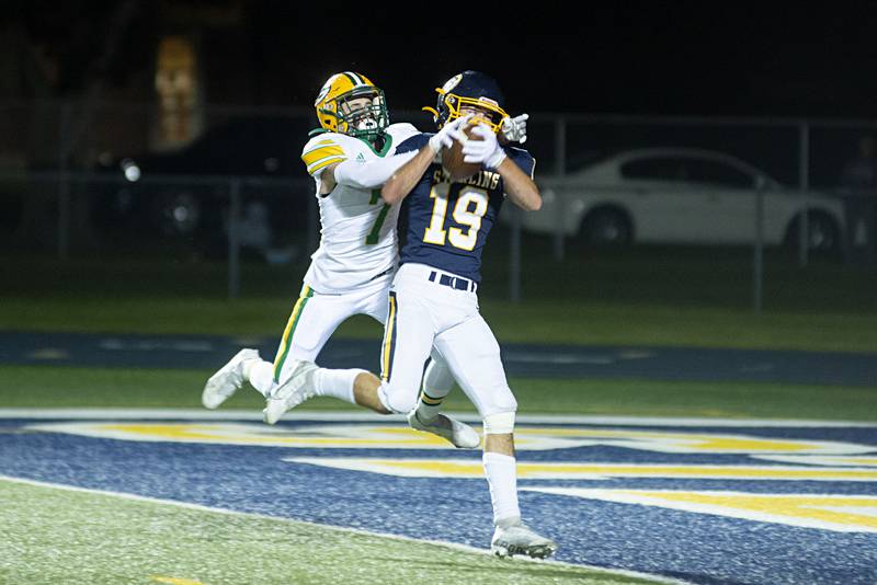 Sterling’s Mason Emin hauls in a pass for a touchdown Friday, Sept. 23, 2022 against Geneseo's Kade VanOpDorp.