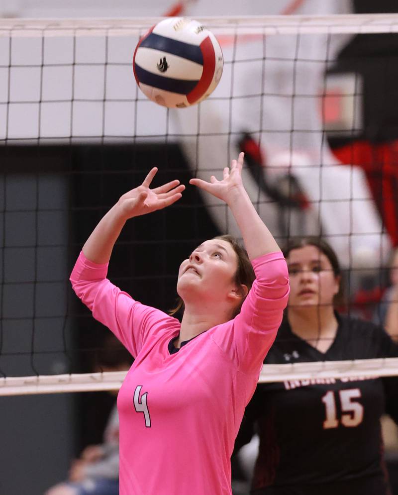 Hiawatha's Zoë Elder sets the ball during their match Tuesday, Oct. 15, 2024, at Indian Creek High School in Shabbona.