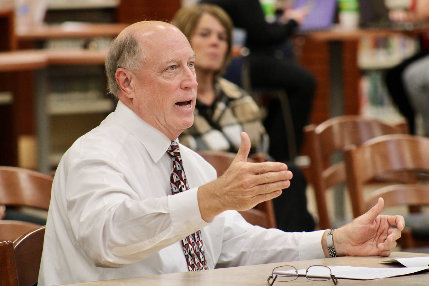 Sterling Public Schools director of finance Timothy Schwingle joins in the presentation on the district's proposed tax levy request.