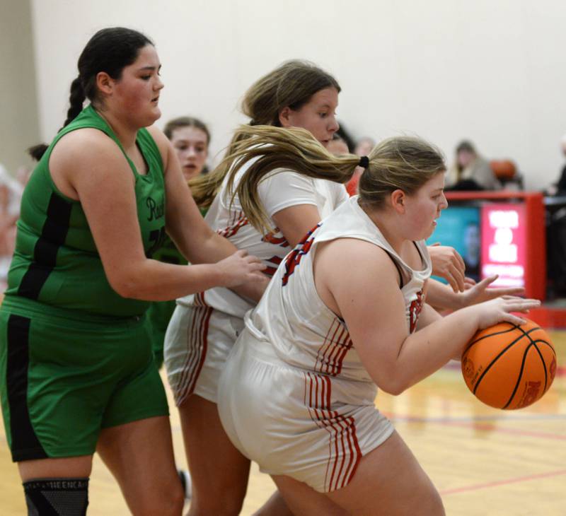 Oregon's Noelle Girton (44) protects the ball from Rock Falls' Ari Reyna (30) during 2A regional action on Saturday, Feb. 15, 2025 at Oregon High School.