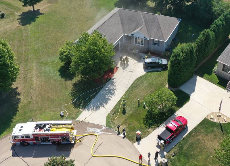 Princeton firefighters work the scene of a house fire in the 600 block of Celebration Dr. on Monday, Aug. 28, 2023 in Princeton.