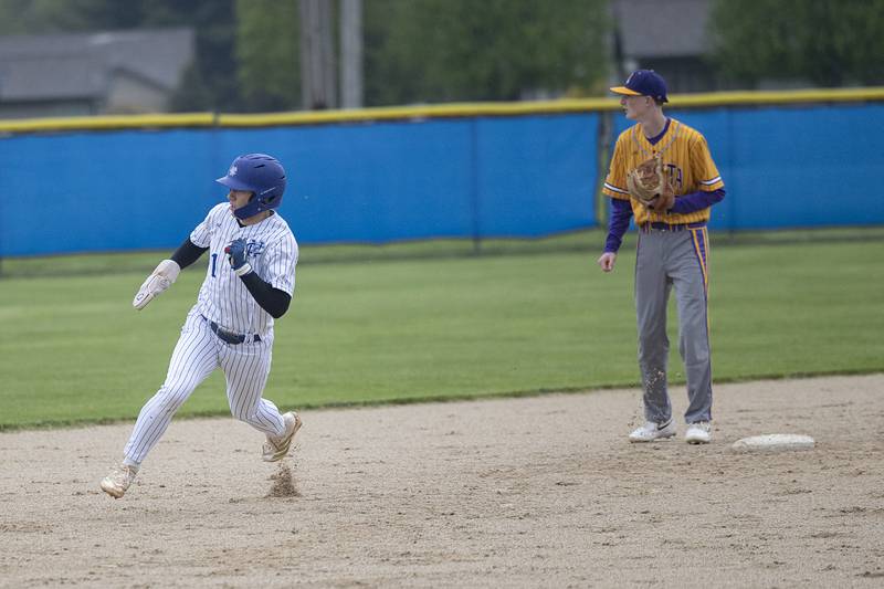 Newman’s Garret Matznick rounds second base on a double by Michael Morse against Mendota Thursday, April 30, 2026.