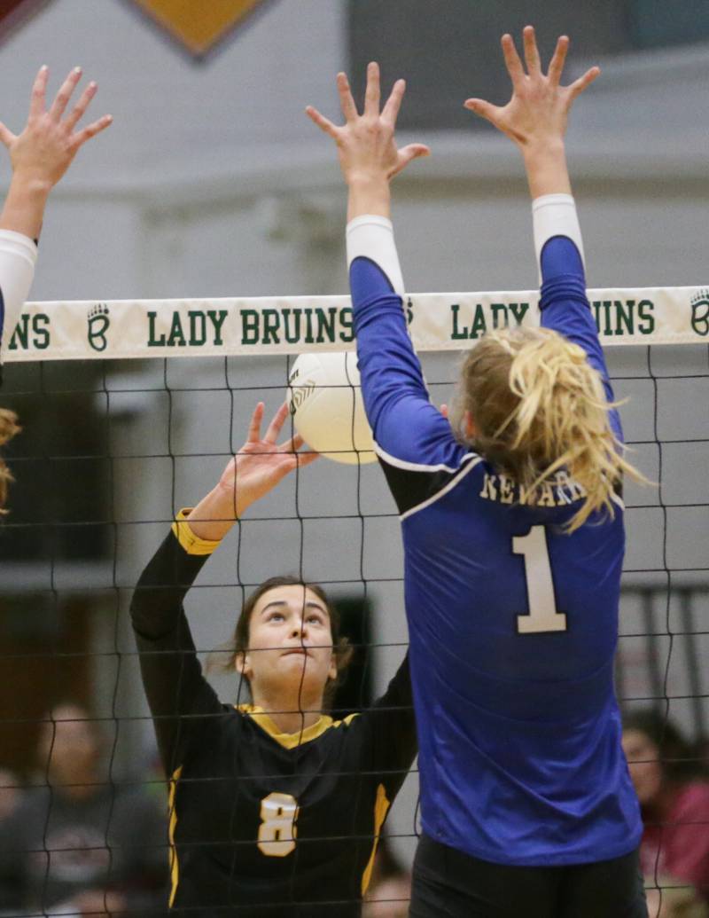 Putnam County's Ava Hatton (8) pushes the ball past Newark's Addison Ness (1) in the Class 1A semifinal game on Wednesday, Oct. 16, 2022 at St. Bede Academy in Peru.