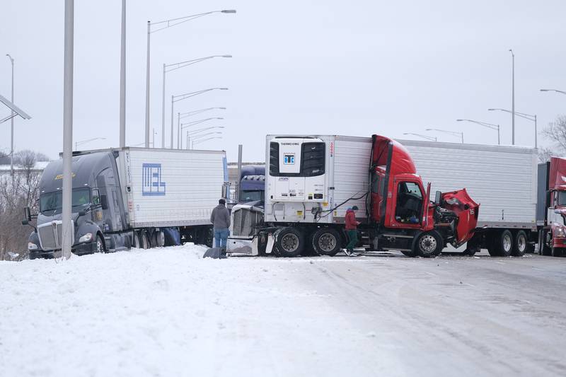 An accident involving three semi-trucks block three lanes along west bound I-80. Thursday, Feb. 3, 2022, in Joliet.