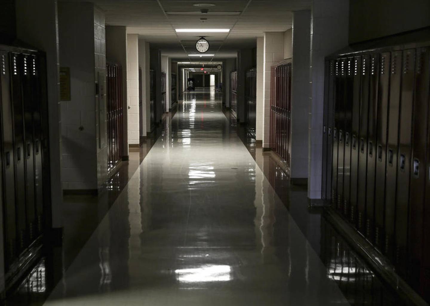 A hallway of lockers sits empty Thursday at Lincoln-Way North High School in Frankfort.
