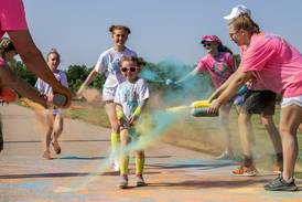 Community runs out to support CASA DeKalb County in annual 5K Color Run