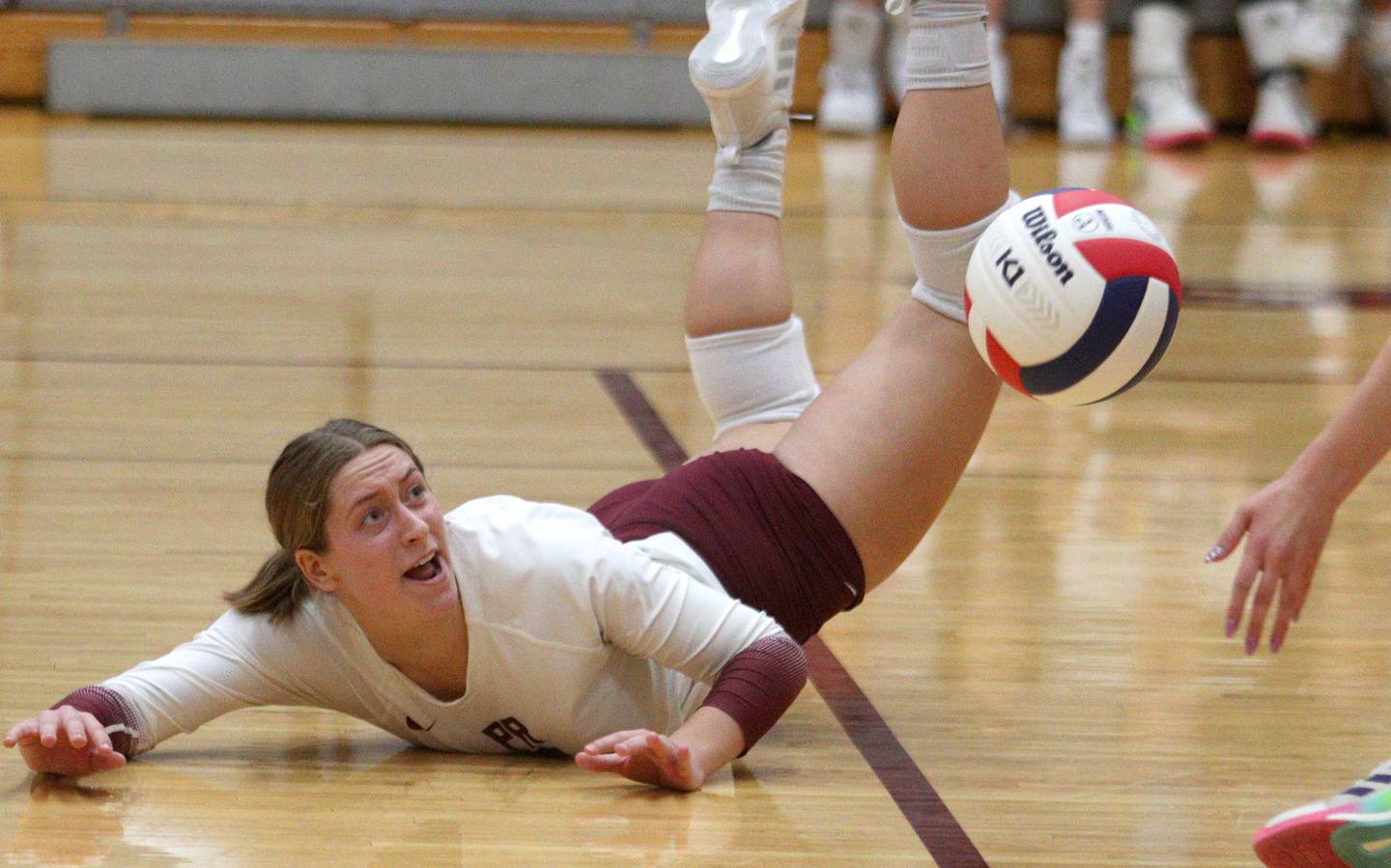 Prairie Ridge’s Grace Jansen dives for the ball against Hampshire during varsity volleyball on Thursday, Oct. 3, 2024, at Prairie Ridge High School in Crystal Lake.