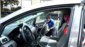 Geneva High School students develop work-based skills at car wash
