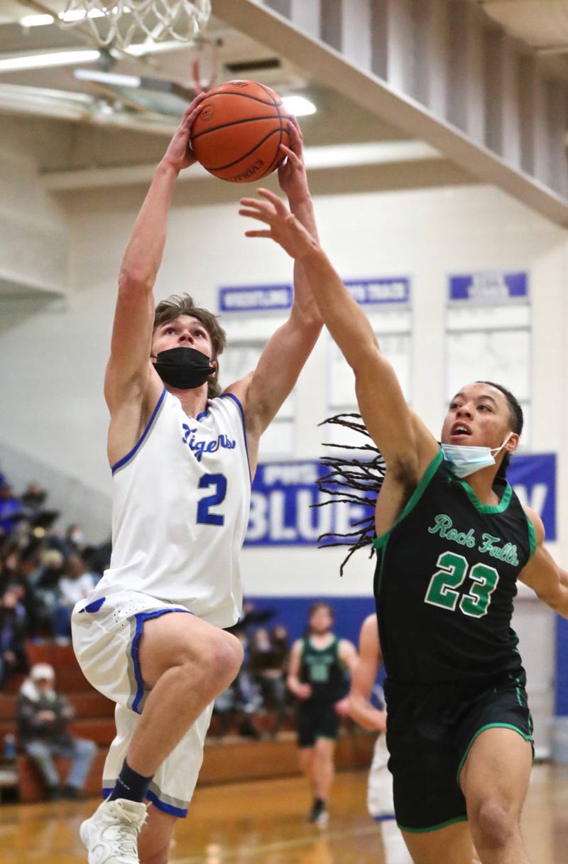 PHS junior Teegan Davis goes up for a first-half dunk against Rock Falls Saturday night at Prouty Gym.