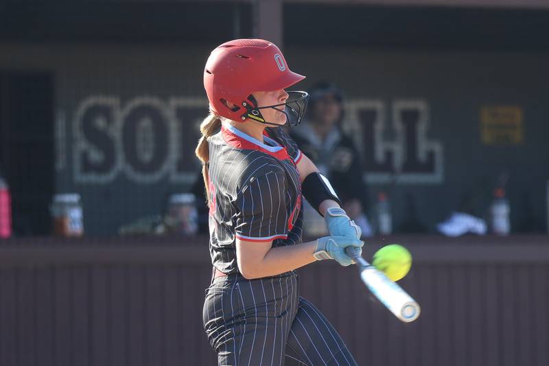 Ottawa’s Joslyn Rose connects on an inside pitch for a two run single against Morris on Wednesday, April 8, 2026 in Morris.