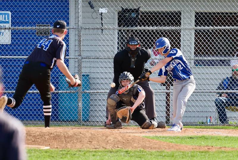 Princeton's Jack Oester takes his rips against Newman's Drake Cole Tuesday at Prather Field. The Comets won 3-2.