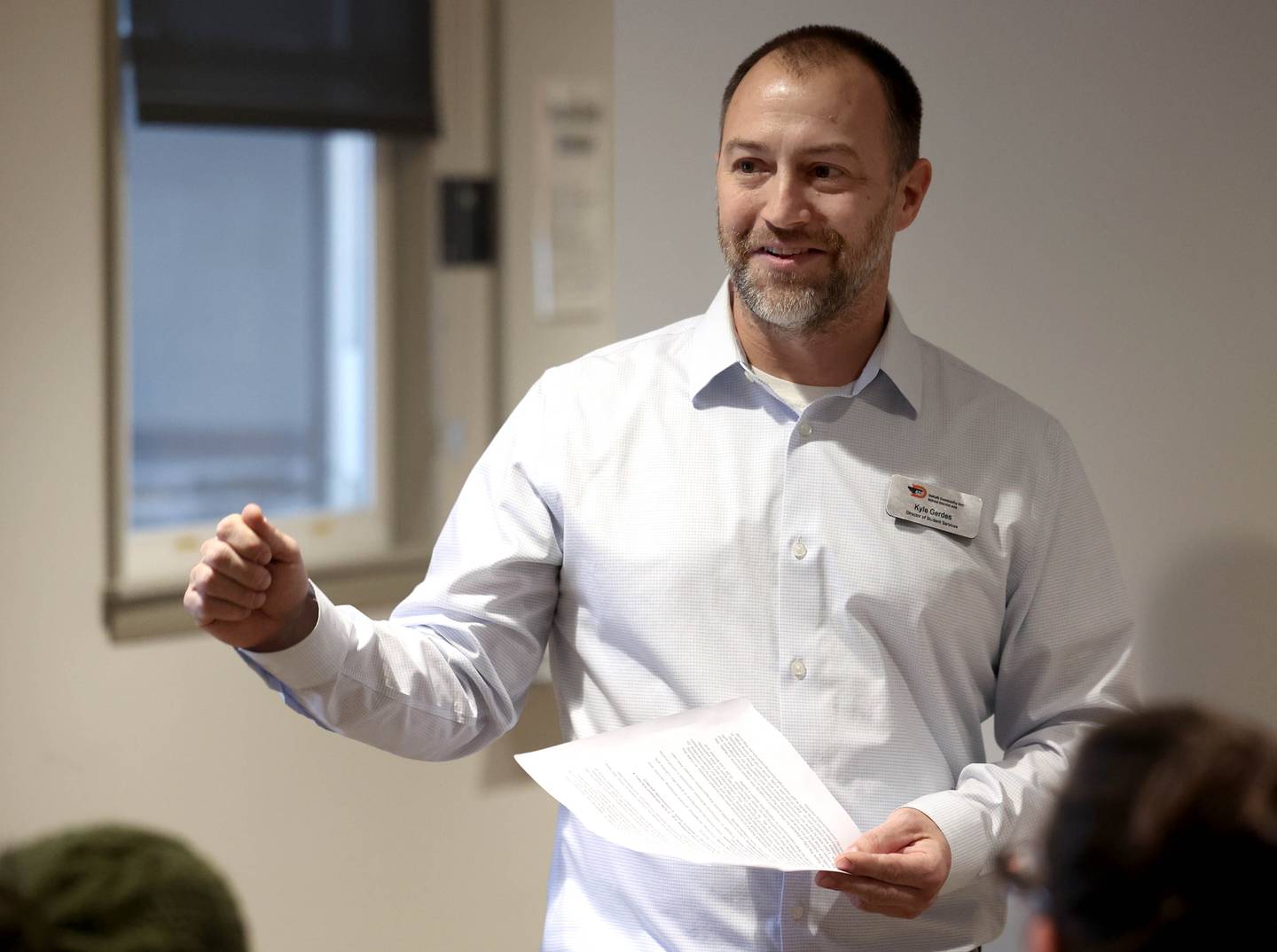 Kyle Gerdes, DeKalb School District 428 student services director, speaks Wednesday, Jan. 22, 2025, during the grand opening celebration of the Beyond One Barb Transition Center in DeKalb. The the transition program has been in place to facilitate students with intellectual and developmental disabilities aged 18-22 into adulthood and independent living.