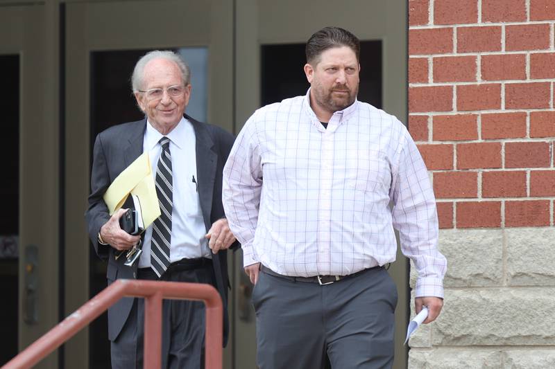Brian Nagra, right, leaves Kendall County Courthouse with his attorney Michael Ettinger on Thursday, Sept. 7, 2023 in Yorkville. The former Joliet Police Officer is motioning to vacate his felony conviction of stealing money from the City of Joliet. Nagra was never fired from the city for the crime.